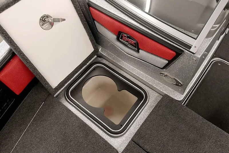 Slide: The Image of 2024 Ranger 1850MS Reata boat interior storage compartment with red and silver accents. - 15