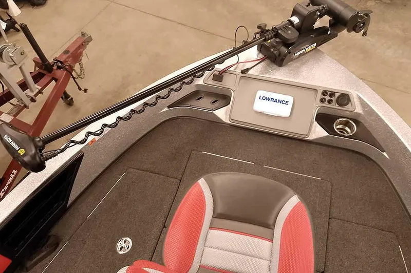 Slide: The Image of 2024 Ranger 1850MS Reata boat interior with Lowrance system and Minn Kota trolling motor. - 18