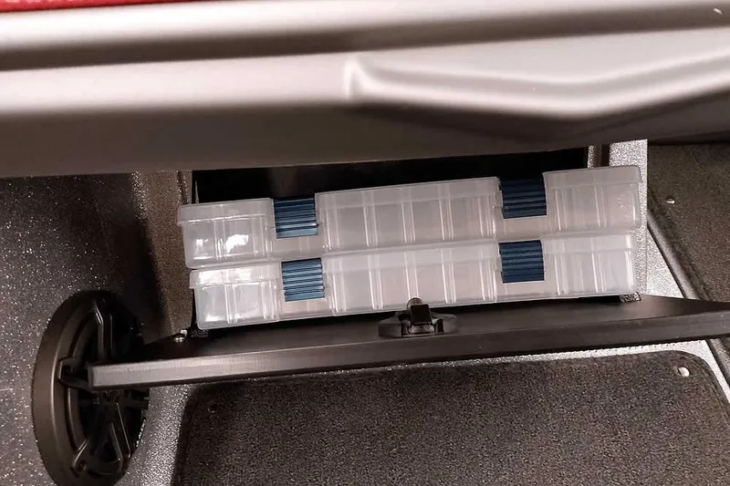 Slide: The Image of Storage compartment in 2024 Ranger 1850MS Reata boat with organized tackle boxes. - 26