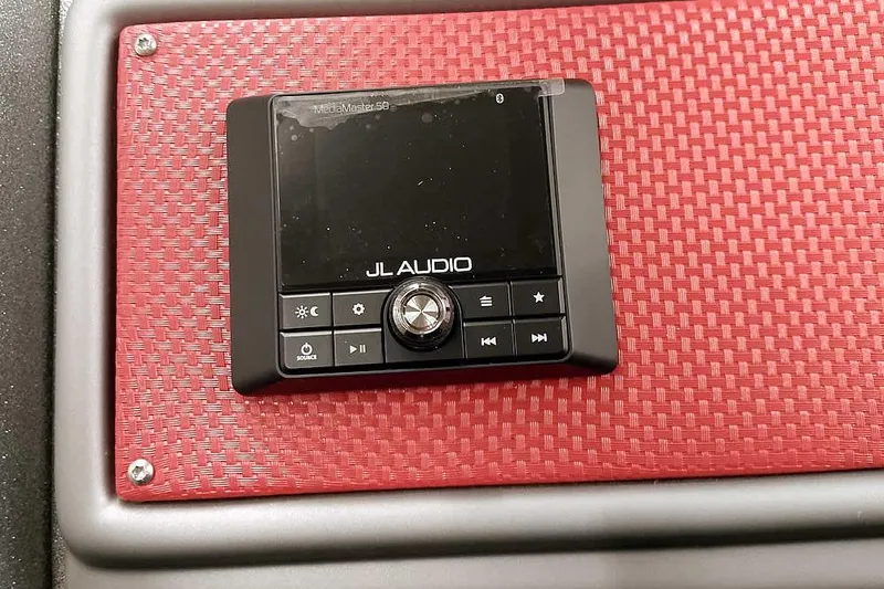 Slide: The Image of JL Audio MediaMaster 50 on red textured panel, 2024 Ranger 1850MS Reata. - 27