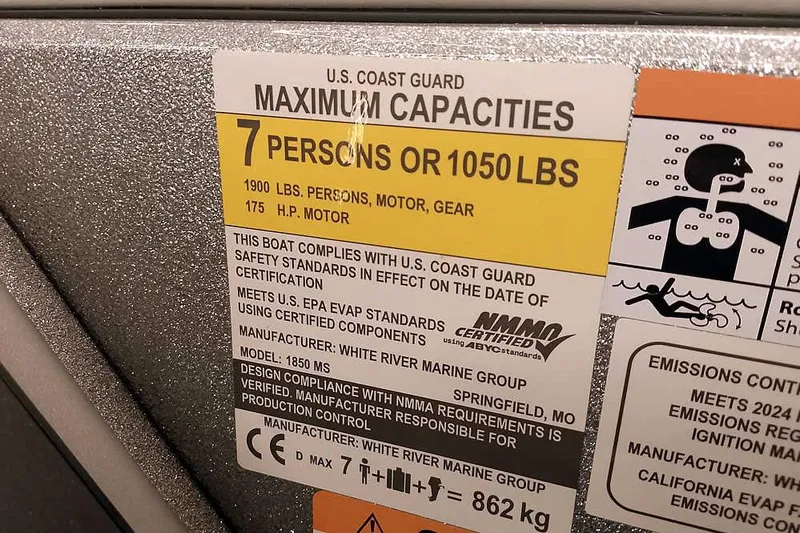 Slide: The Image of 2024 Ranger 1850MS Reata boat capacity label, 7 persons or 1050 lbs, 175 HP motor. - 29