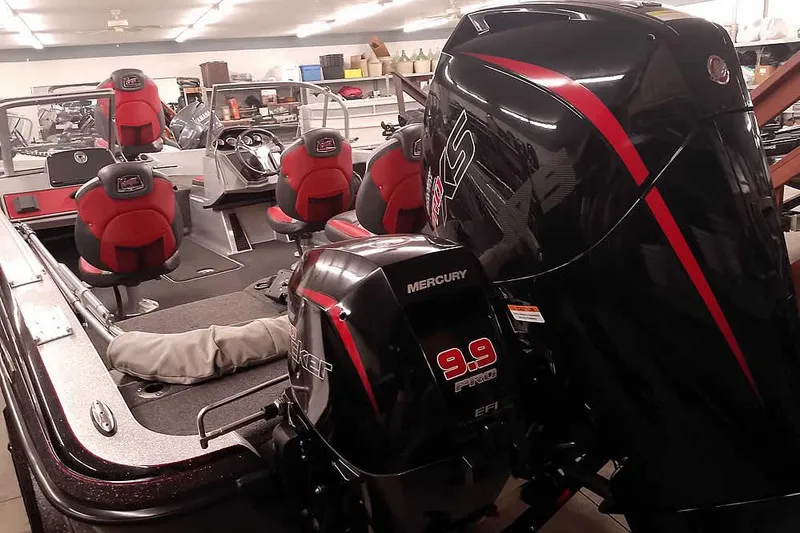 Slide: The Image of 2024 Ranger 1850MS Reata boat with Mercury outboard engines in showroom. - 4