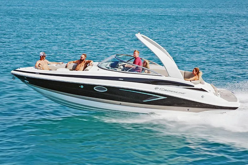 Slide: The Image of Manufacturer Provided Image: 2025 Crownline 278 SS speedboat cruising on clear blue water with passengers enjoying the ride. - 3
