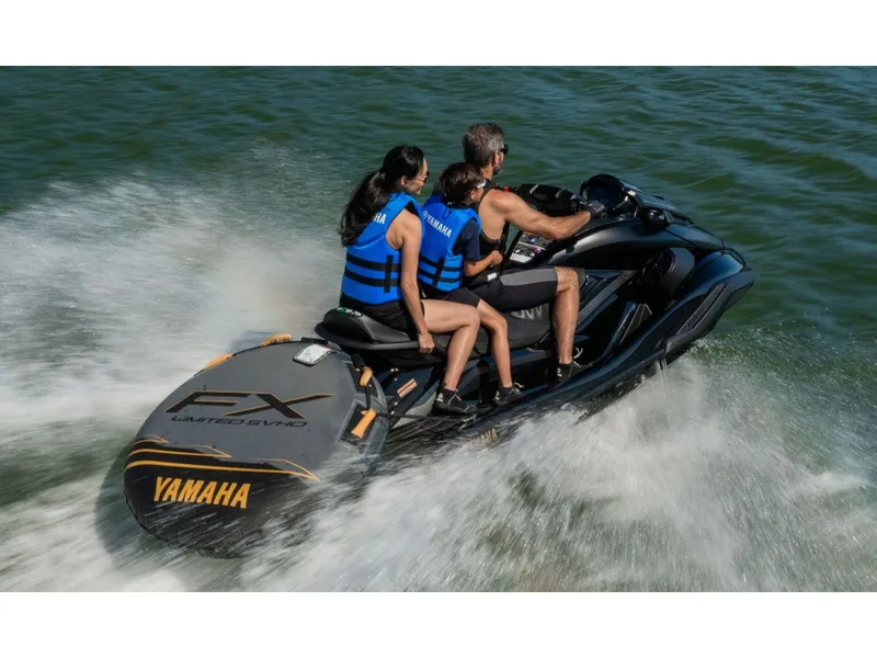 Slide: The Image of Yamaha FX Limited SVHO 2026 on water with three riders. - 16