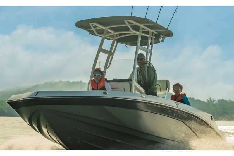 Slide: The Image of Yamaha 190 FSH Sport 2026 on water with three people. - 11