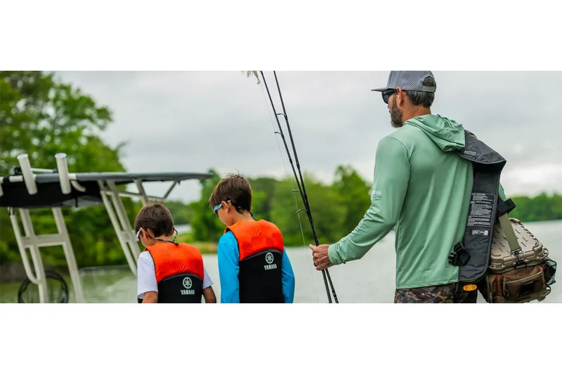 Slide: The Image of Family fishing on Yamaha 190 FSH Sport boat, 2026 model. - 7