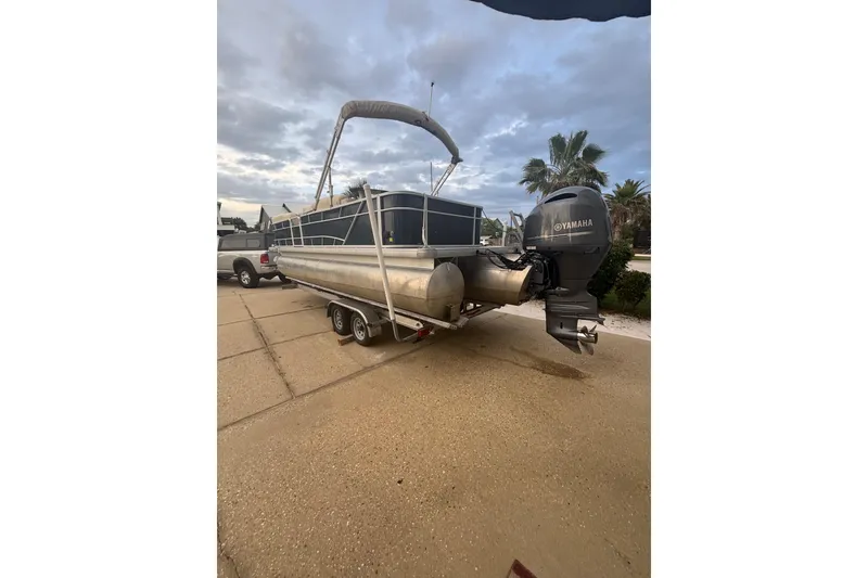 The Image of 2018 Godfrey Sweetwater 2486 C pontoon boat with Yamaha outboard motor on trailer. - 0