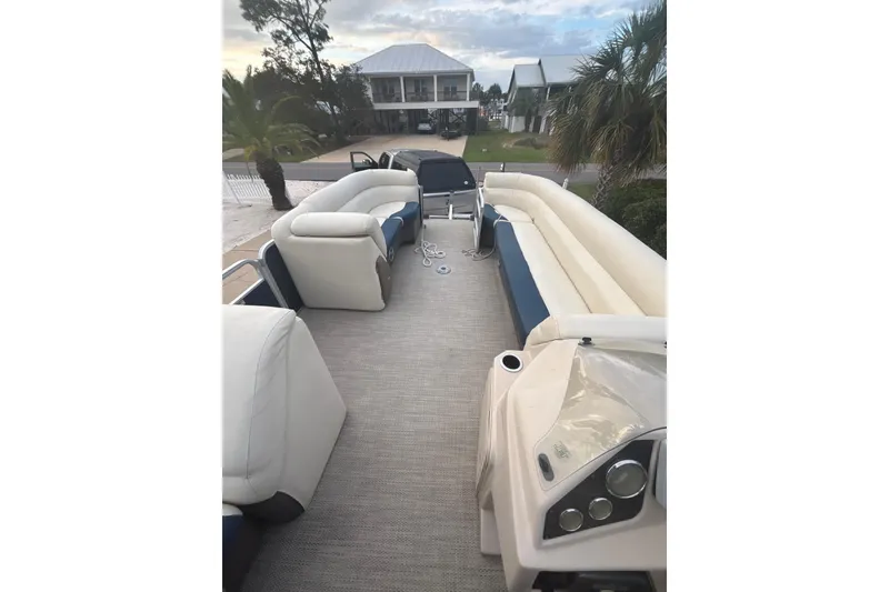 Slide: The Image of 2018 Godfrey Sweetwater 2486 C pontoon boat with spacious seating and modern design. - 2
