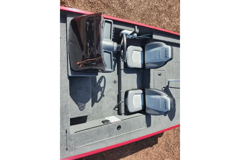 Slide: The Image of 2026 Lowe Skorpion 17 boat interior with dual seats and steering console. - 12