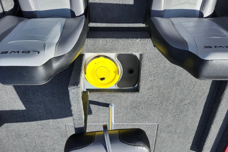 Slide: The Image of Interior of 2026 Lowe Skorpion 17 boat showing seating and storage compartment. - 18