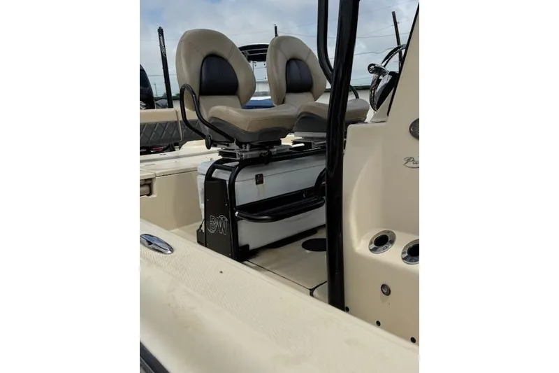 Slide: The Image of 2019 Blue Wave 2400 PureBay boat interior with dual cushioned seats. - 17