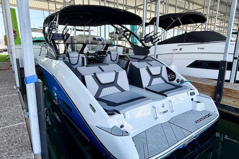 The Image of 2024 Yamaha Boats 222XE in marina, showcasing sleek design and modern features. - 0