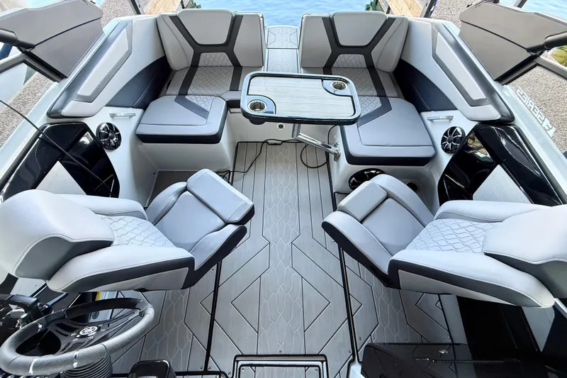 Slide: The Image of 2024 Yamaha Boats 222XE interior with sleek seating and modern design. - 3