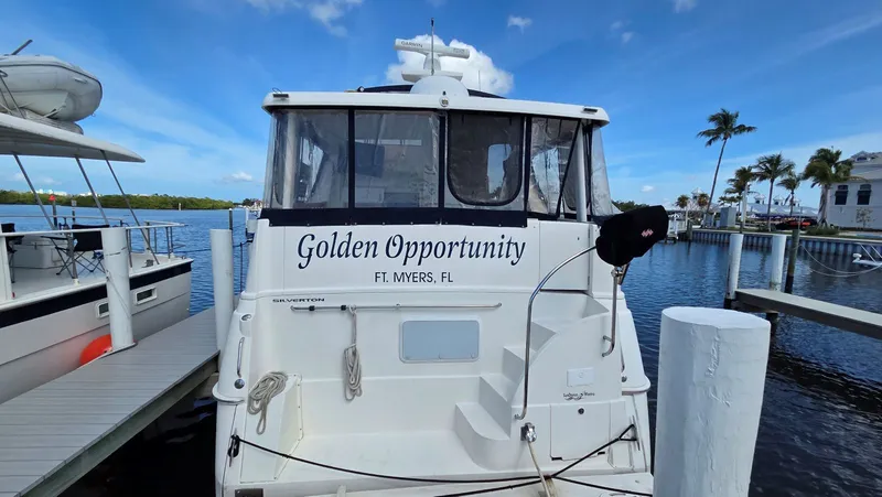 Slide: The Image of 2001 Silverton 453 yacht docked in Fort Myers, Florida. - 11
