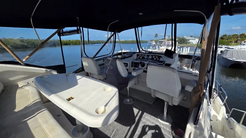 Slide: The Image of Interior of a 2001 Silverton 453 yacht overlooking the water. - 17