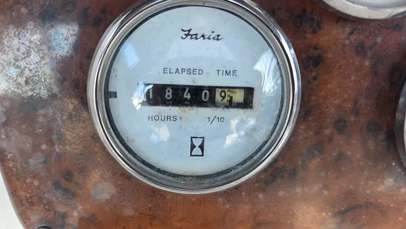 Slide: The Image of Faria hour meter on Silverton 453, displaying 8409 hours. - 22