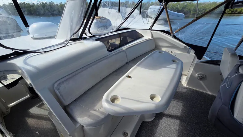 Slide: The Image of Interior of a 2001 Silverton 453 yacht with seating area. - 27