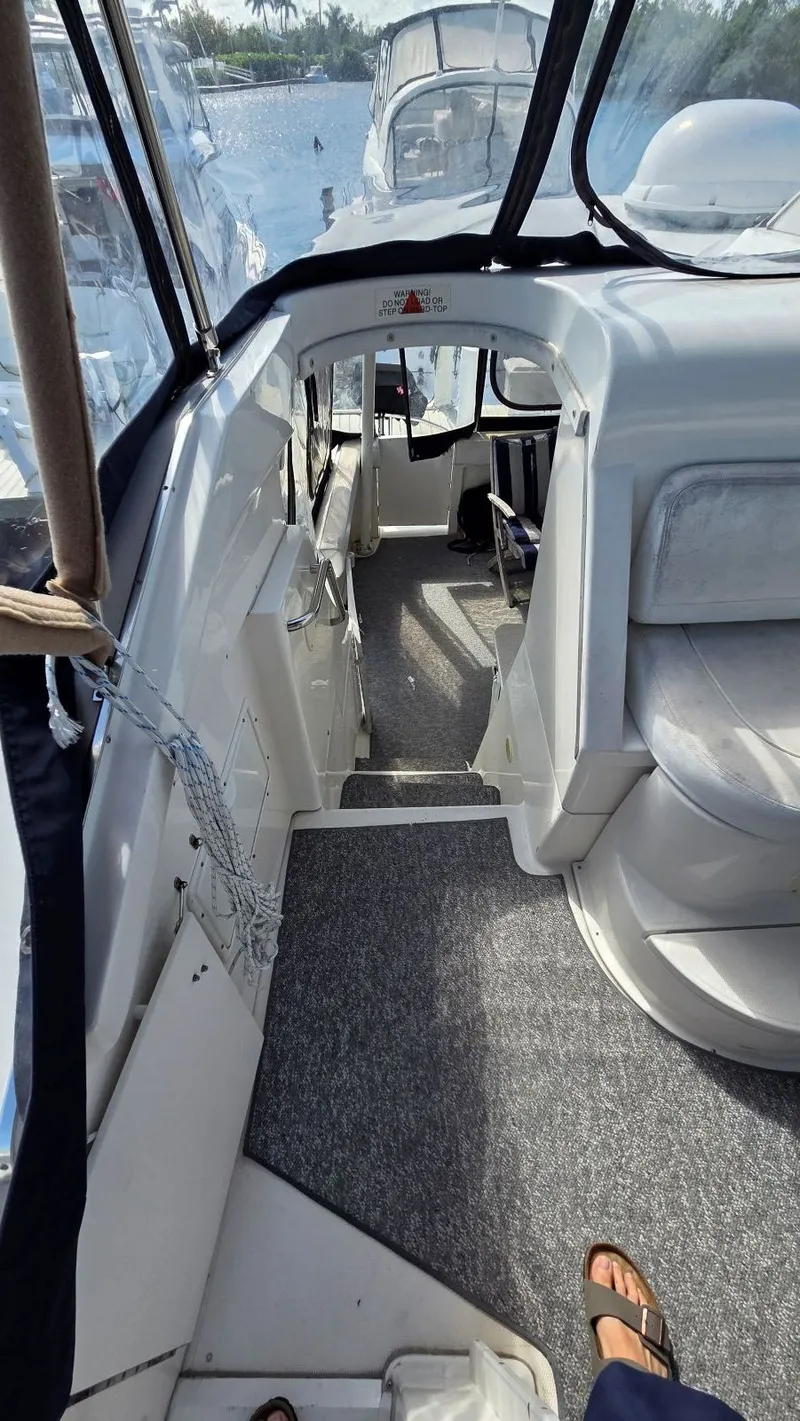 Slide: The Image of Interior of a 2001 Silverton 453 yacht, view of the walkway. - 28