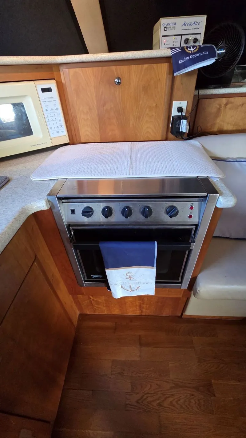 Slide: The Image of Kitchen area on a 2001 Silverton 453 yacht. - 37