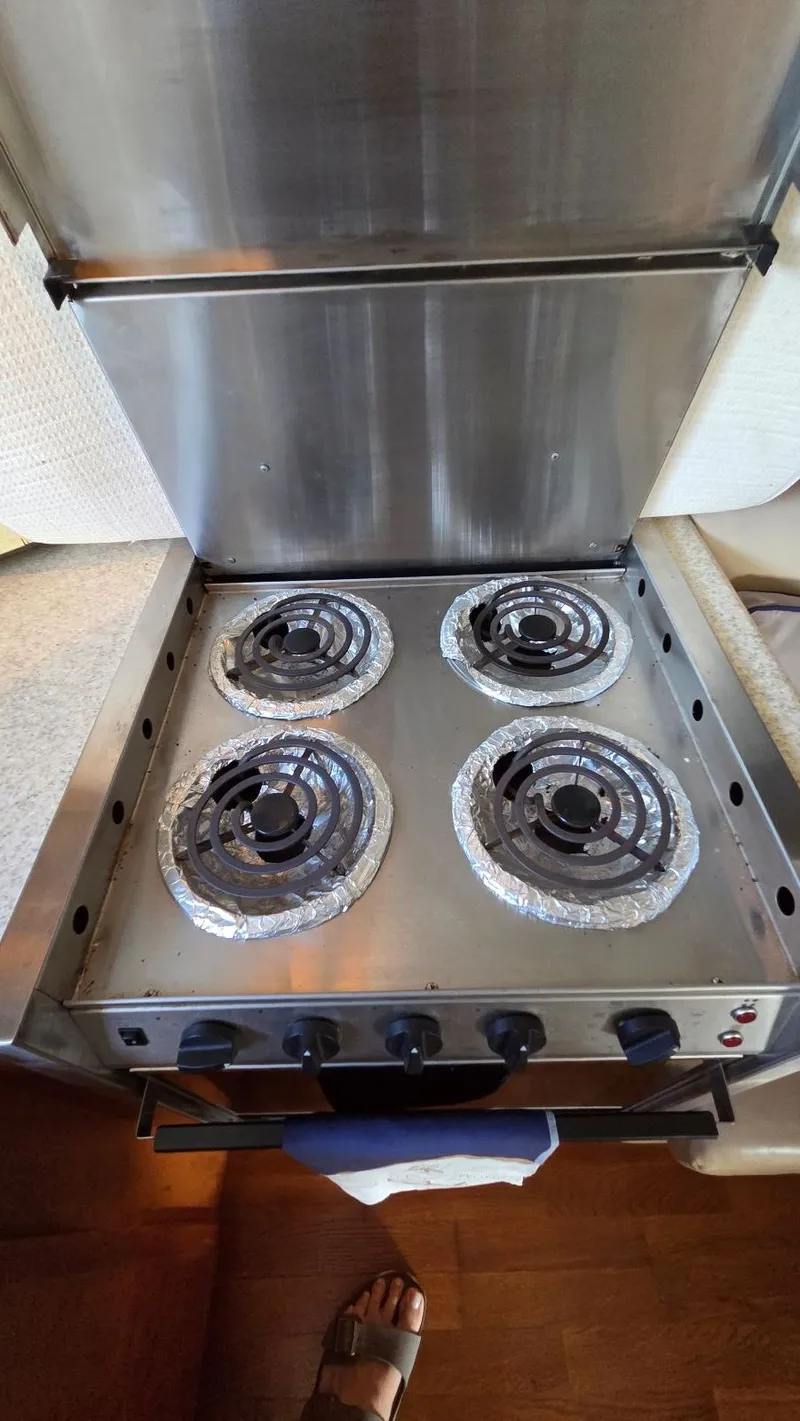 Slide: The Image of Four-burner stove in a 2001 Silverton 453 yacht kitchen. - 38