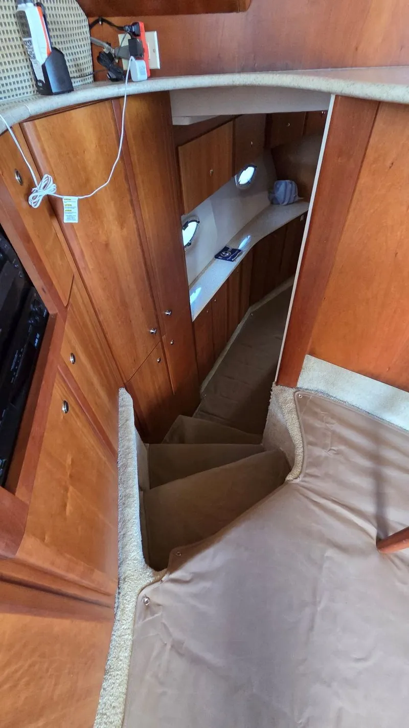 Slide: The Image of Interior of a 2001 Silverton 453 yacht with wood paneling. - 41