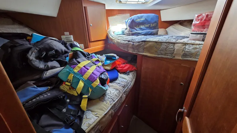 Slide: The Image of Interior of a 2001 Silverton 453 yacht with sleeping berths. - 45