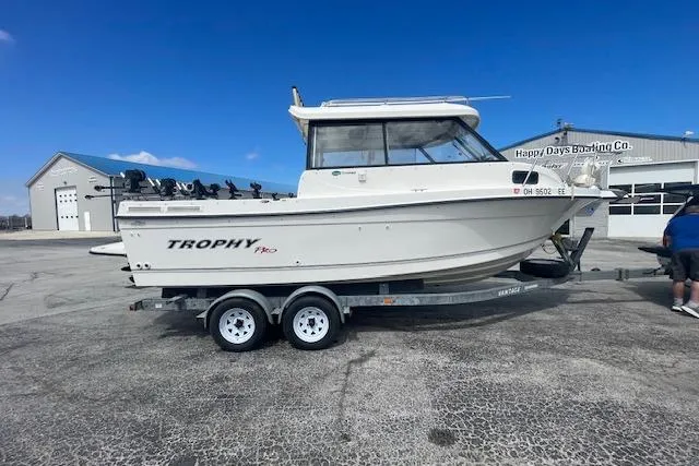 Slide: The Image of 2006 Trophy 2359 Hardtop boat on trailer at Happy Days Boating Co. - 3