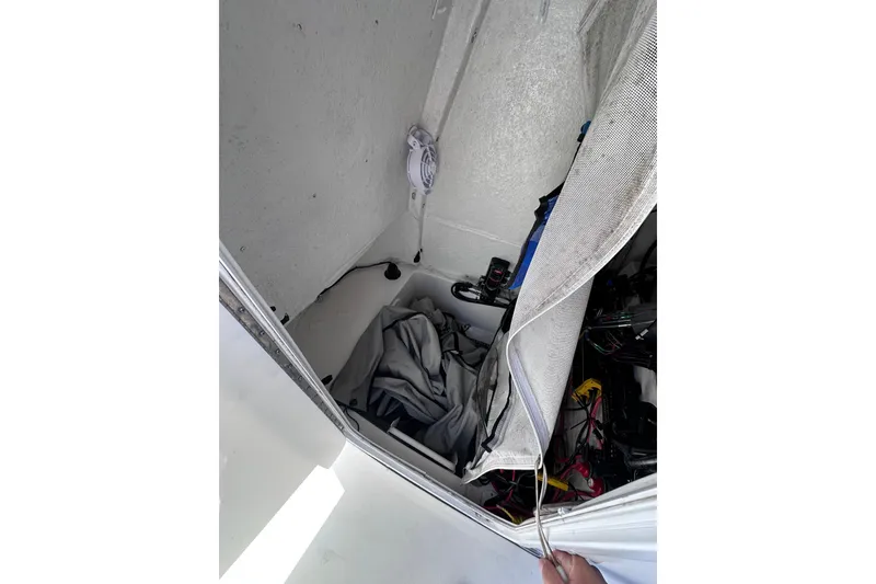 Slide: The Image of Interior storage compartment of 2017 Tidewater 252 CC Adventure boat. - 12