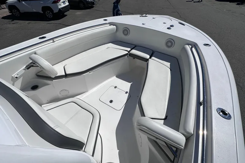 Slide: The Image of 2017 Tidewater 252 CC Adventure boat with spacious seating and sleek design. - 13