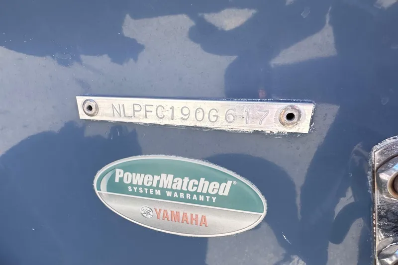 Slide: The Image of 2017 Tidewater 252 CC Adventure boat with Yamaha PowerMatched warranty badge. - 19