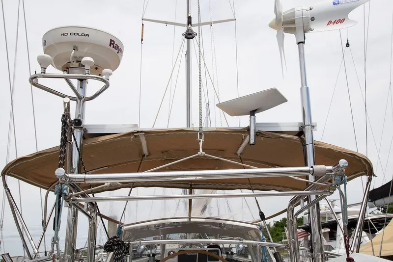 Slide: The Image of Sailboat Outbound 46 (2015) with radar and wind turbine equipment on deck. - 22