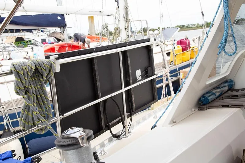 Slide: The Image of Sailboat deck with solar panel and ropes, Outbound 46, 2015 model. - 24