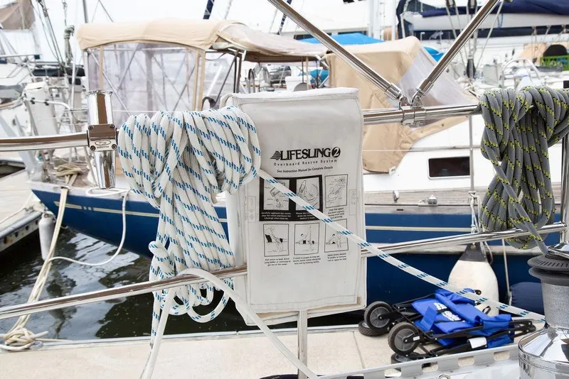 Slide: The Image of Sailboat deck with Lifesling rescue system and ropes, Outbound 46, 2015 model. - 27