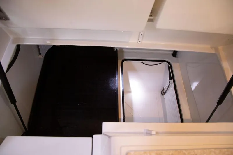 Slide: The Image of Interior view of 2015 Outbound 46 yacht storage compartment. - 38