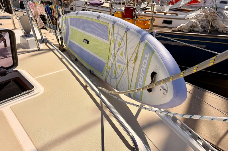 Slide: The Image of Sailboat "Callipyge" docked, Outbound 46 model, 2015, with solar panel and ropes. - 4