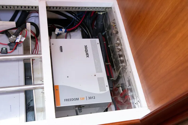 Slide: The Image of Electrical system with Xantrex Freedom SW 3012 inverter in 2015 Outbound 46 yacht. - 47