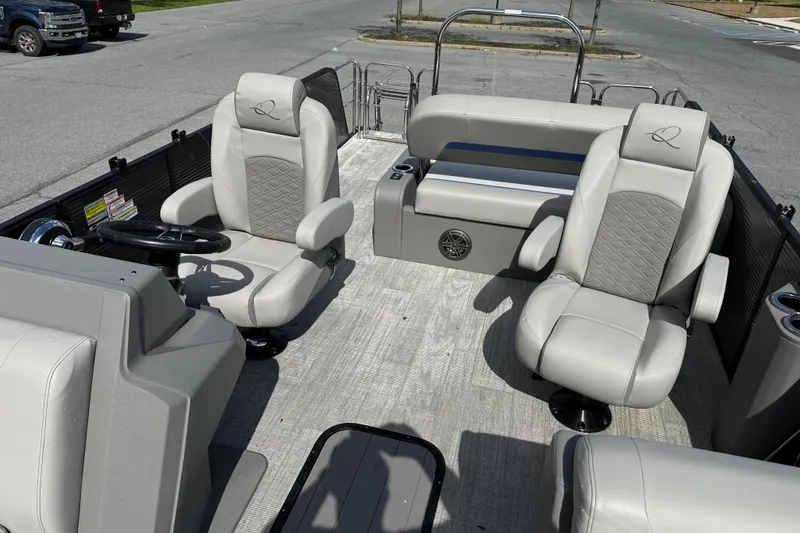 Slide: The Image of 2025 Qwest Splash Pad E-Class boat interior with luxurious seating and modern design. - 11