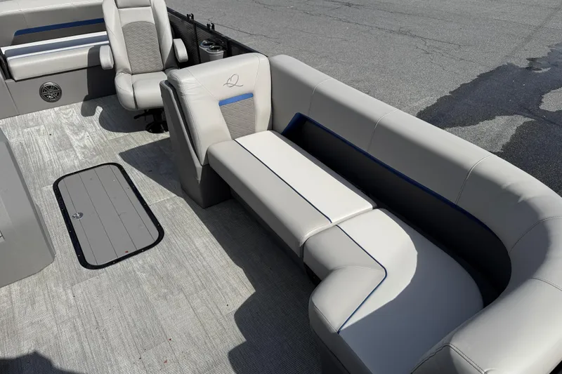 Slide: The Image of Interior of 2025 Qwest Splash Pad E-Class boat with luxurious seating. - 6