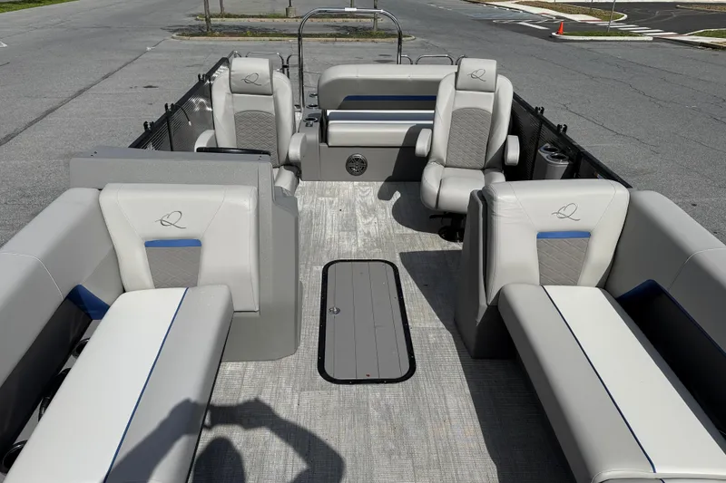 Slide: The Image of Interior of 2025 Qwest Splash Pad E-Class pontoon boat with luxurious seating. - 8