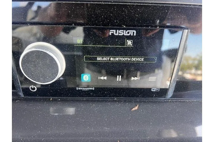 Slide: The Image of Fusion stereo system on a 2020 Blackfin 332 CC boat, displaying Bluetooth device selection. - 12