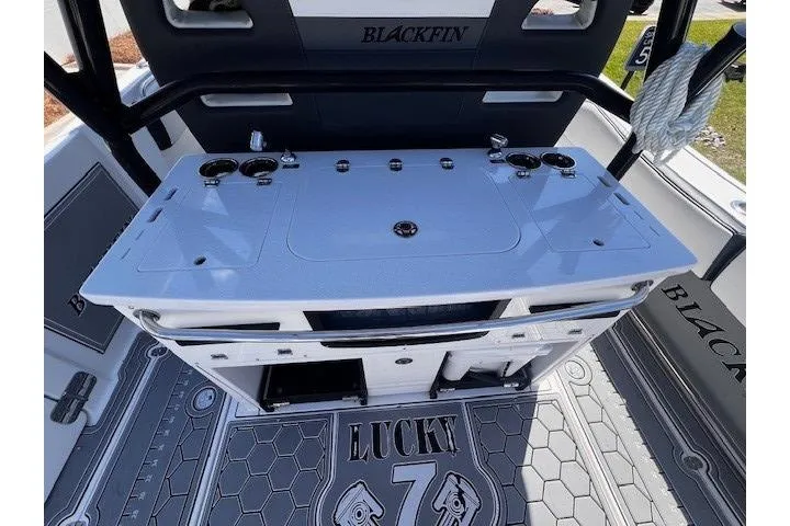 Slide: The Image of 2020 Blackfin 332 CC boat interior with fishing station and "Lucky 7" floor design. - 14