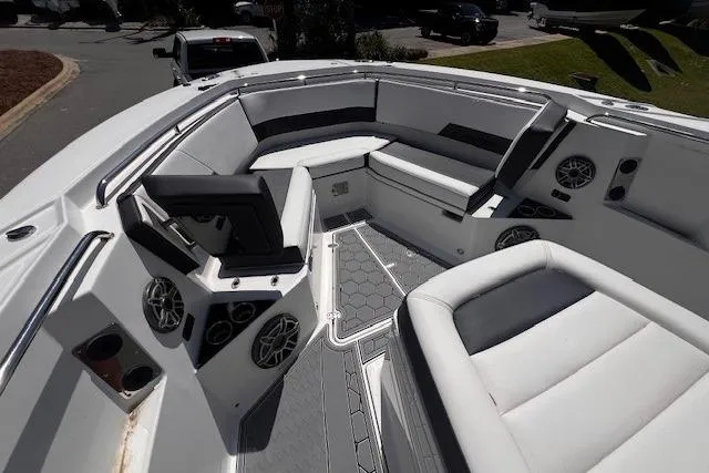 Slide: The Image of 2020 Blackfin 332 CC boat interior with cushioned seating and modern design. - 18