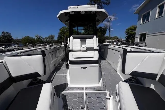 Slide: The Image of 2020 Blackfin 332 CC boat interior with white seating and modern design. - 20