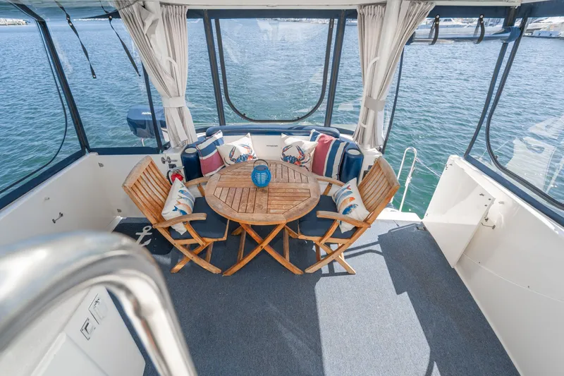 Slide: The Image of Interior of a 2004 Silverton 39 MY Diesel yacht with wooden furniture. - 12