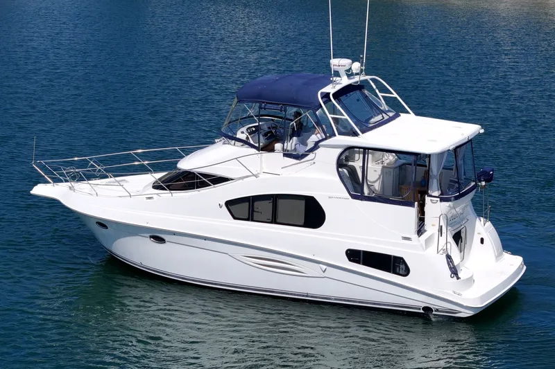 Slide: The Image of 2004 Silverton 39 MY Diesel yacht on calm waters. - 2