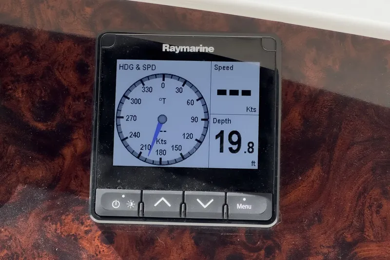 Slide: The Image of Raymarine display on 2004 Silverton 39 MY Diesel, showing depth 19.8 ft. - 22