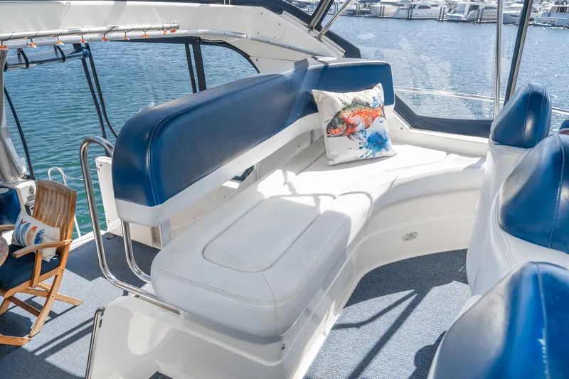 Slide: The Image of Interior of 2004 Silverton 39 MY Diesel yacht with blue seating. - 25