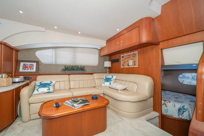 Slide: The Image of Interior of a 2004 Silverton 39 MY Diesel yacht with leather sofa. - 28