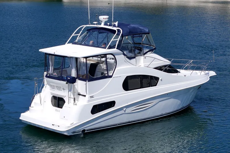 Slide: The Image of 2004 Silverton 39 MY Diesel Yacht on calm waters. - 3