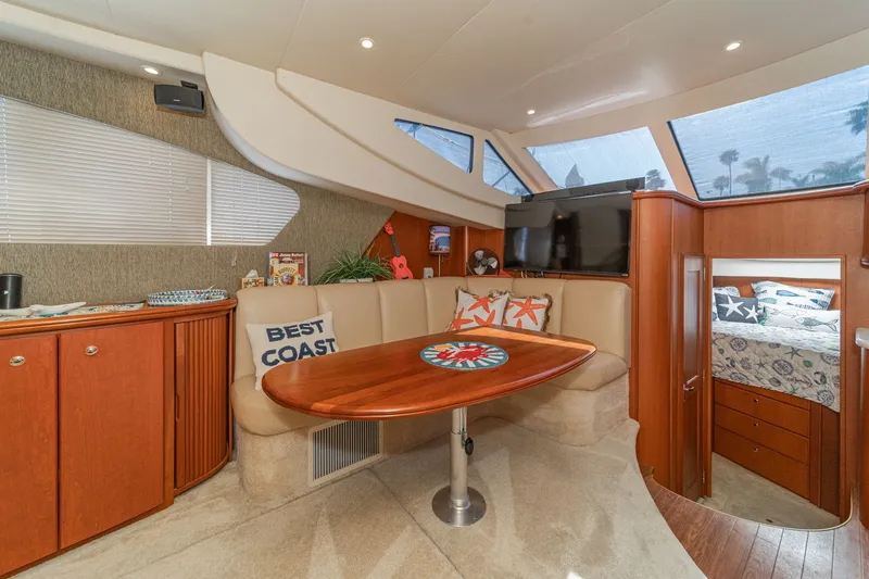 Slide: The Image of Interior of a 2004 Silverton 39 MY Diesel yacht with cozy seating area. - 31